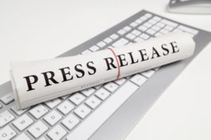 press release written on newspaper