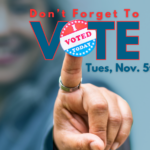 Woman showing the camera a sticker that says "I voted today". Overlay text reads "Don't forget to vote Tues, Nov. 5th"