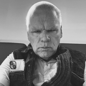 An up close photo of Ray, a White man with IDD