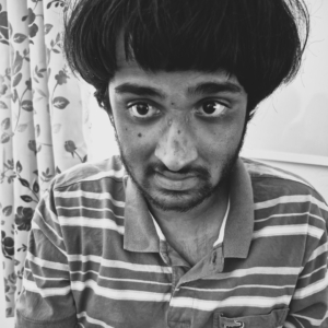 An up close photo of Sarvesh, a Middle Eastern man with IDD